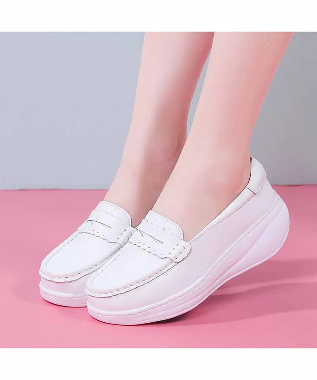 White penny slip on rocker bottom sneaker